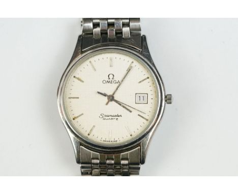 Omega Seamaster quartz stainless steel wrist watch. The watch having a textured white dial with baton markings to the chapter
