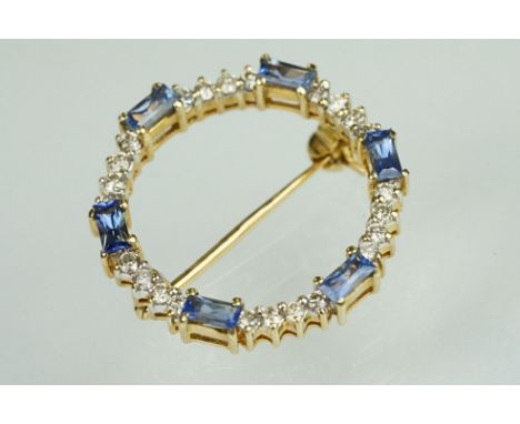 Sapphire and diamond 18ct yellow gold wreath brooch, six baguette cut sapphires, dimensions approx 2mm x 4mm, twenty-four sma