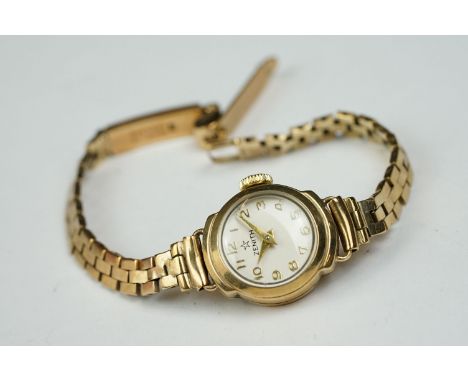 Zenith ladies 9ct gold wristwatch, gold cased circular dial, Arabic numerals, 9ct gold bracelet strap, in Longines watch case