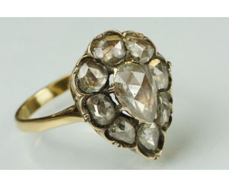 18th century diamond cluster ring head with later 18ct yellow gold ring shank; rose cut pear shaped principal diamond to the 