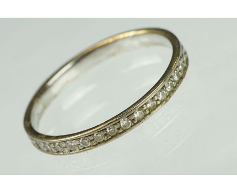 18ct white gold and diamond eternity ring. The ring being set with throughout with round brilliant cut diamonds. Hallmarked B