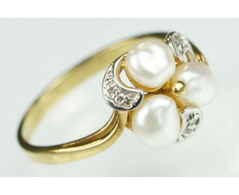 Pearl and diamond 9ct yellow and white gold set ring, three cream freshwater pearls with three small round eight cut diamond 