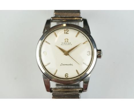 A vintage gents Omega Seamaster automatic wristwatch, Omega logo to dial and crown, stainless steel case on fixoflex strap, c