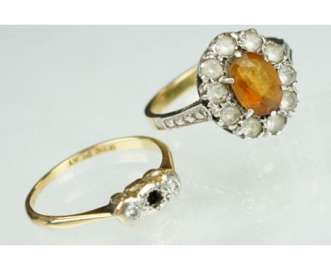 Gem set 18ct yellow gold cluster ring, size O; together with a diamond 18ct yellow gold and platinum set ring, one stone defi