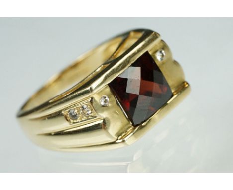 Garnet and white topaz 9ct yellow gold ring, the square mixed rose cut garnet measuring approx 7.5mm x 8mm, flush set, six sm