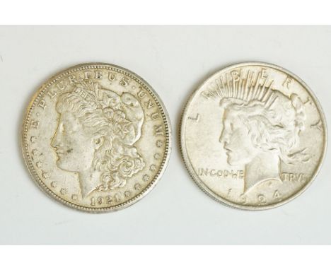 A United States of America 1924 silver peace dollar together with a United States of America 1921 silver Morgan Dollar coin. 