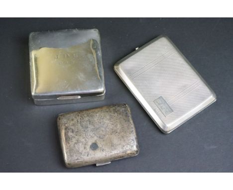 Two silver cigarette cases, comprising a late Victorian example with engraved monogram to centre and foliate decoration to th