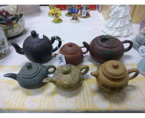 Five Chinese ceramic teapots and soapstone examples (6)