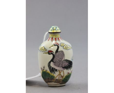 Ceramic and copper Chinese perfume bottle depicting birds and signed to the bottom
