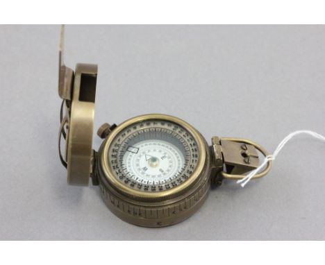Brass military compass marked TG Co Ltd London 1940 mkIII1