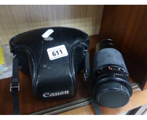 Canon Camera in Case with Lens