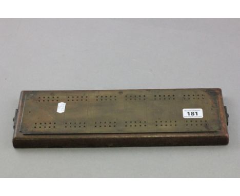 Antique brass and wood cribbage board