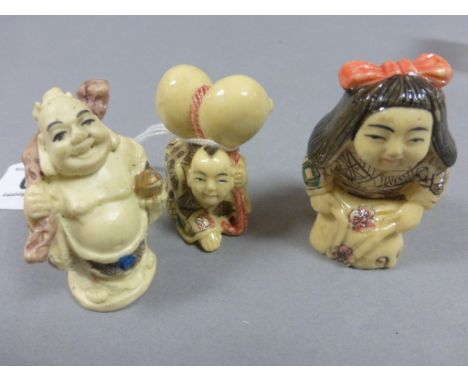 Three netsuke carvings including girl with pet, Buddha and crawling boy
