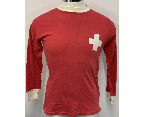 Switzerland Football Shirt: Red long sleeve with white trim. Obtained by West Brom player John Wile during his career. We do 