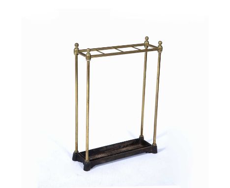Brass stick stand19th Century, of plain rail form with iron drip tray, 42cm long, 13cm wide, 56cm highCondition report: Some 
