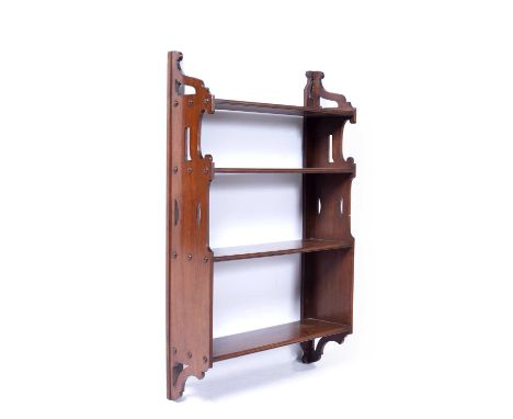 Three-tier wall shelf late 19th/early 20th Century, with cut out decoration, 59cm x 95cm x 18cm Condition report: Overall ok 