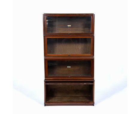 Group of mahogany Globe Wernicke glazed front shelvesconsisting of 5 glazed front shelves, an enclosed front shelf, loose cor