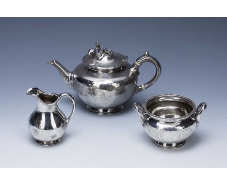 Three-piece Scottish Victorian silver bachelors tea set consisting of a teapot, milk/cream jug and a sucrier, each with engra