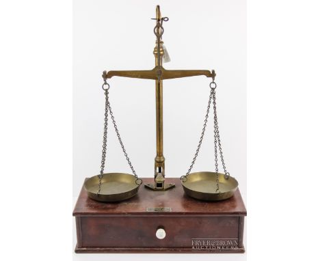 A set of C. Stevens &amp; Son balance weighing scales, with many weights, with mahogany single drawer stand, including Grains