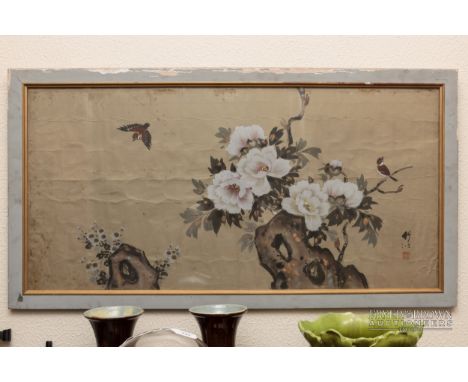 A Chinese watercolour painting on silk paper, of pink peony, rockwork and birds, calligraphy and red seal, 90 x 44cm approx.