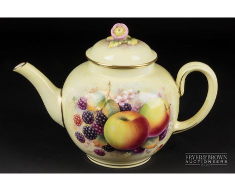 A Royal Worcester porcelain tea pot &amp; cover, signed P. Platt, painted with fruit and blossom on a pale yellow ground, blo