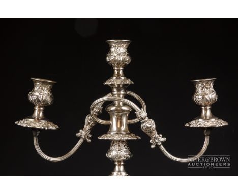 A late 19th century silver plated three-light candelabra, the foot inscribed '32 Fighter Sqdn from Sqdn Ldr D.L. Blackford 19