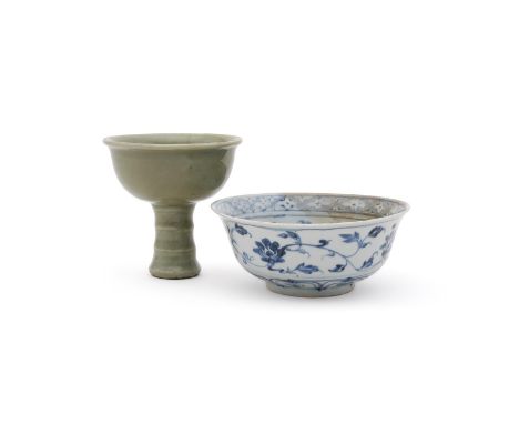 A Chinese longquan celadon stem cup, Ming Dynasty (1368 - 1644), the cup covered inside and out with a light glaze of sea-gre