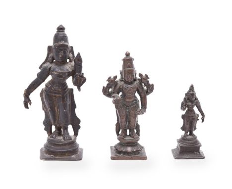 Three South Indian bronze figures of Hindu deities, Tamil Nadu, 18th-19th centuries, two depicting Sri Devi, the third Vishnu