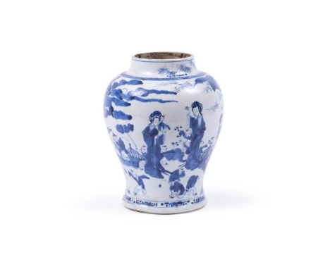 A Chinese blue and white vase, Kangxi, painted with a continuous scene of ladies and children at play in a garden, the base w