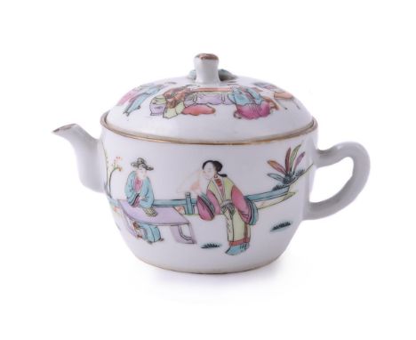 An attractive Chinese famille rose teapot and cover, Tongzhi, decorated with figures in a fenced garden scene, the base with 