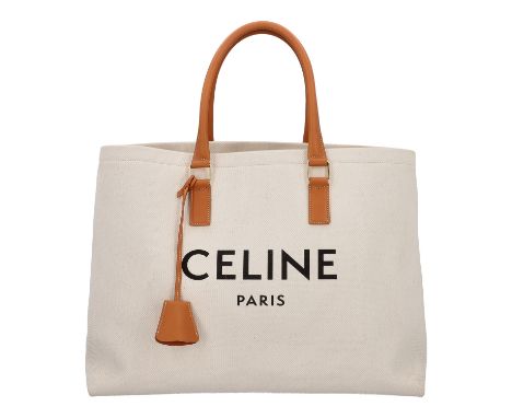 CELINE Shopper, akt. NP.: 1.400,-€. Geräumiges Modell aus Canvas mit schwarzem Logo-Druck auf der Front und Leder-Details in 