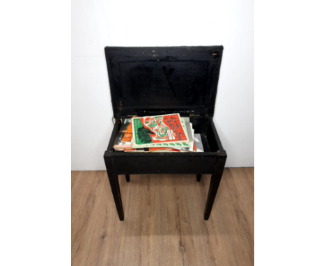 A LEATHER STUDDED PIANO STOOL CONTAINING SHEET MUSIC