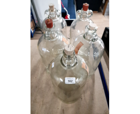 FIVE LARGE VINTAGE GLASS DEMIJOHN