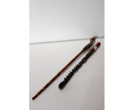 TWO HAND CARVED MAGIC WANDS