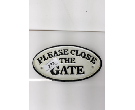 A CAST METAL SIGN PLEASE CLOSE THE GATE