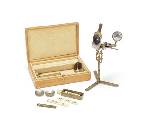A rare George Lindsay brass portable microscope, English, 1746,the silver plaque signed Geo. Lindsay Inv(r) &amp; Fec(r), the