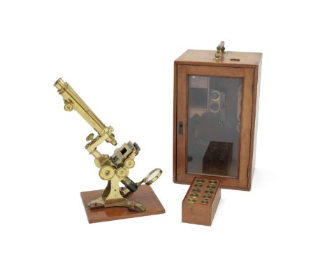 A J.H. Steward Compound Binocular Microscope, English, circa 1870,signed J.H. Stewart 406 Strand, with dual adjustment to the