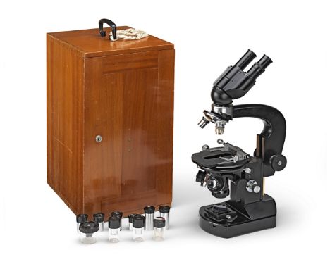 A Carl Zeiss Compound Binocular Microscope, German, second half 20th century,stamped KARL ZEISS JENA, 338043, with binocular 