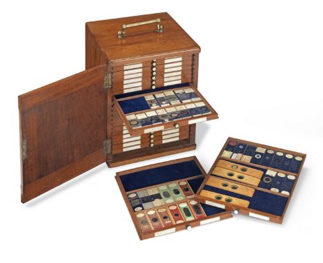 A Large Collection of Microscope Specimen Slides, English, late 19th century,including a mahogany case with hinged door, open