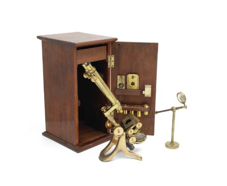 A Compound Binocular Microscope, English, Late 19th century,with dual adjustment to the eye pieces, rack and pinion focusing,