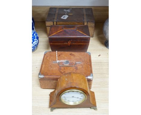 A 19th century mahogany tea caddy, writing slope, leather box and mantel clock, largest 30cm wide