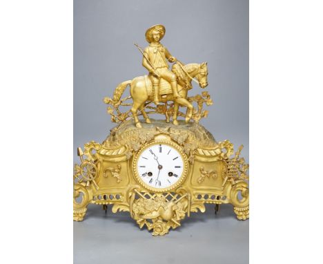 A Louis XV style gilt metal cased eight day mantel clock, 37cm tall
