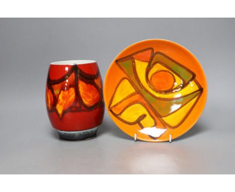 A Poole pottery orange and red abstract vase and plate, 20cm diameter