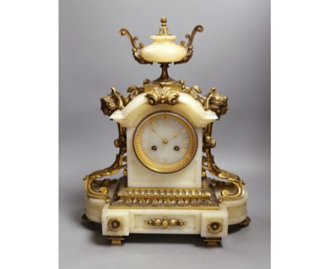 A late 19th century French ormolu mounted alabaster mantel clock. 42cm tall