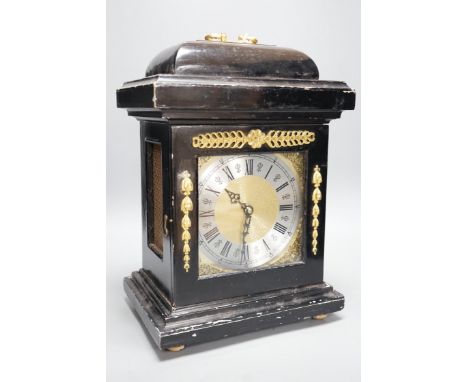 An ebonised bracket clock, 40cm