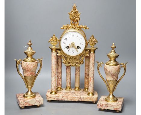A French gilt metal and marble clock garniture, 38cm