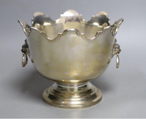 An Edwardian silver Monteith style rose bowl, with lions mask ring handles and 1910 presentation inscription, Mappin &amp; We