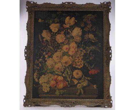 An ornate gilt gesso frame,containing a 19th century Dutch still life print, frame inside measurements 35" x 28"