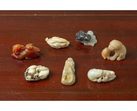 A GROUP OF SEVEN JADE AND HARDSTONE CARVINGS Including a monkey on a finger citron, a recumbent lion, a lion with its cub etc
