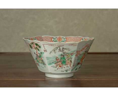 A FAMILLE VERTE HEXAGONAL PORCELAIN BOWL In the Kangxi style, with shaped rim. the panelled sides each decorated with a diffe